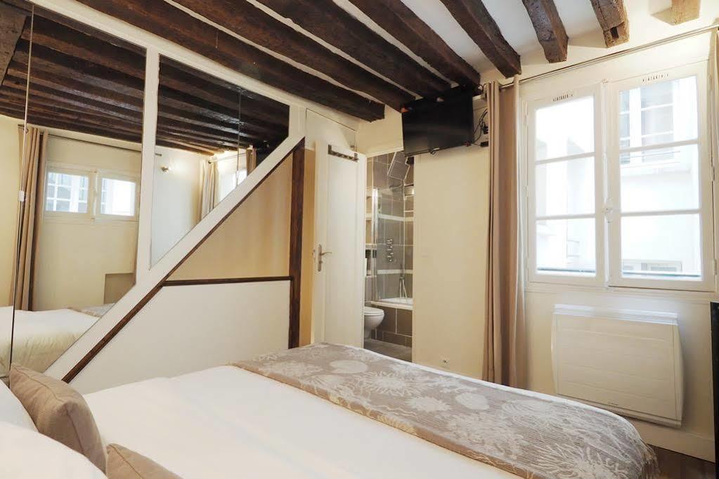Appartamento Louvre Parisian Chicsuites